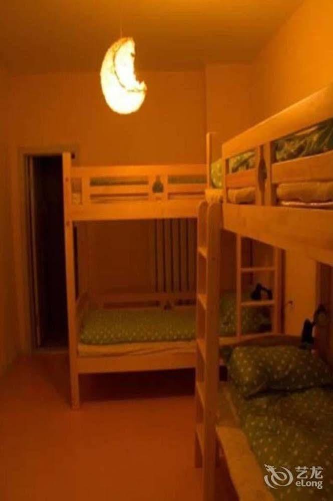 Dalian Buzz Light Year Youth Hostel Esterno foto