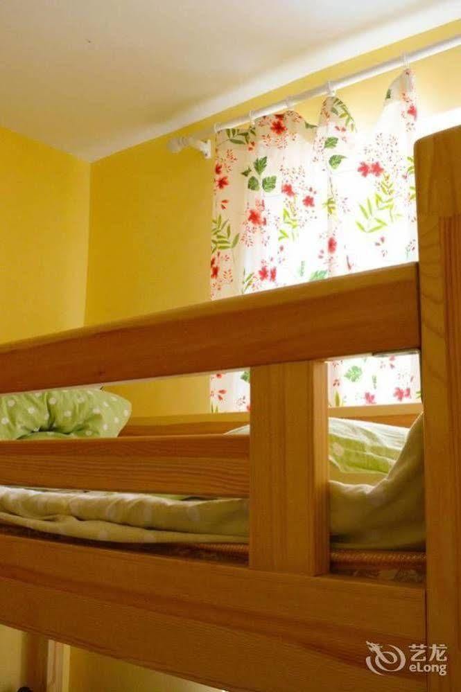 Dalian Buzz Light Year Youth Hostel Esterno foto